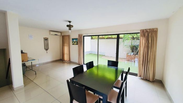 3-Bedroom Townhouse in Umgeni Park For Sale with Private Garden and Garage.