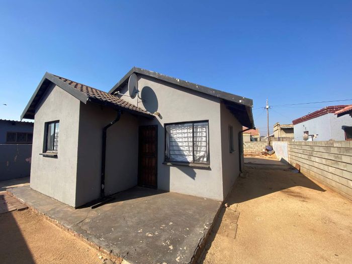 Two-bedroom house in Protea Glen, for sale with expansion potential and amenities nearby.