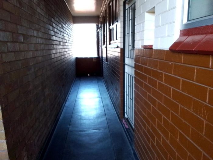 2-bedroom apartment in Durban Central, for sale with income potential and security features.