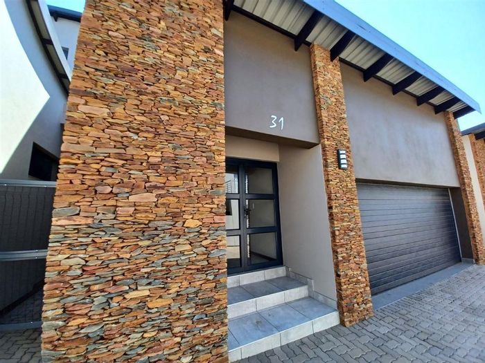 For Sale: Glen Marais Townhouse with 3 bedrooms, patio, garden, and double garage.