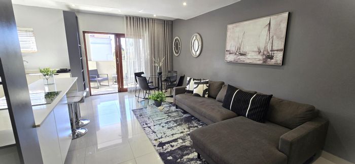 Loft-style 1-bedroom apartment with patios and secure parking in Strathavon To Rent.