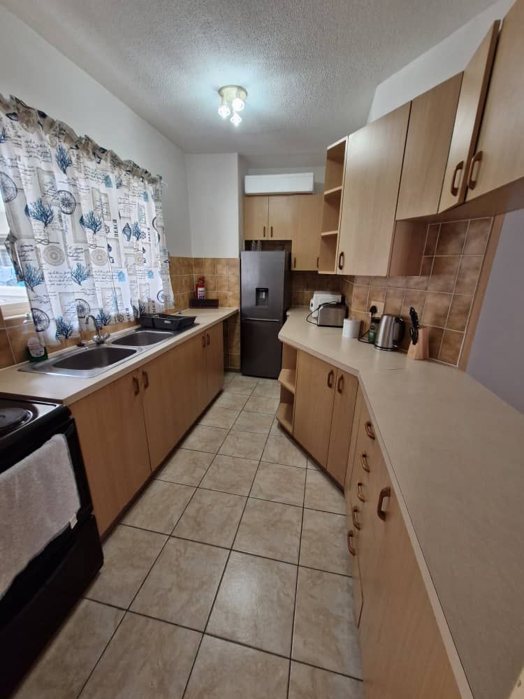 Kitchen with ample cupboards