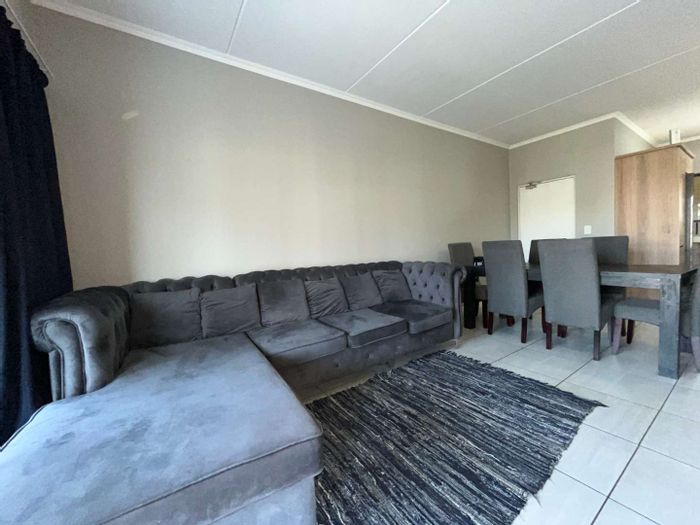 For Sale: 2-Bedroom Apartment in Midrand Central with Gourmet Kitchen and Amenities.