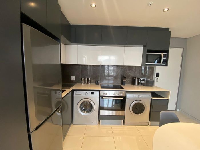 Fully furnished apartment in Sandton Central, 24-hour security, ideal for professionals. To Rent.