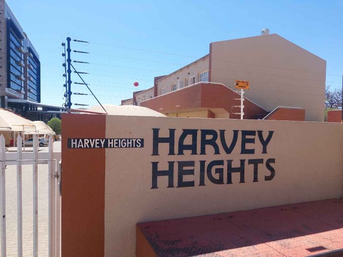 For Sale: Windhoek West Townhouse with 2 units, secure parking, and open-plan living.