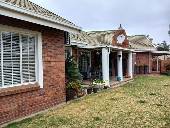 For Sale: House in Kempton Park Ext 4 with garden, garage, and security features.