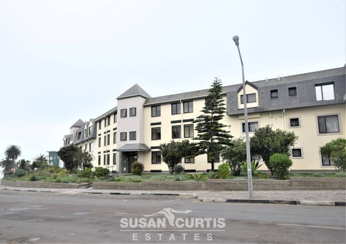 For Sale: Apartment in Swakopmund Central, 2 beds, garage, near shops and beach.