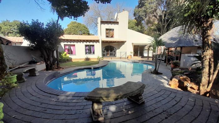 For Sale: House in Birch Acres with double entrances, pool, and entertainment patio.