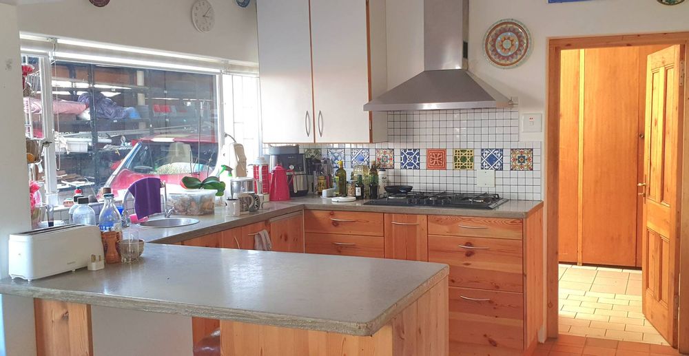 Kitchen opening into Scullery