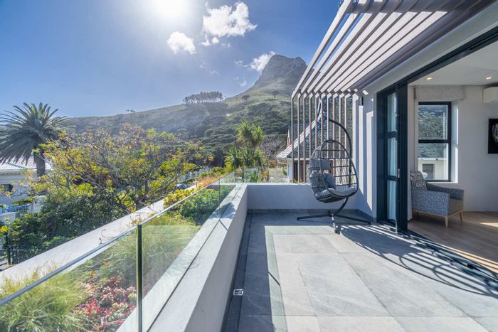 Camps Bay House For Sale: Six bedrooms, pools, ocean views, and luxury amenities.