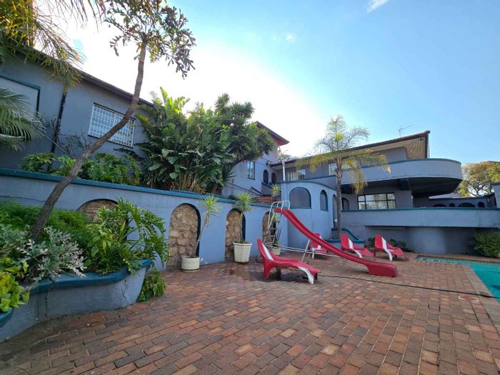 For Sale: Oakdene House with 9 Bedrooms, Indoor Pool, and Extensive Parking.