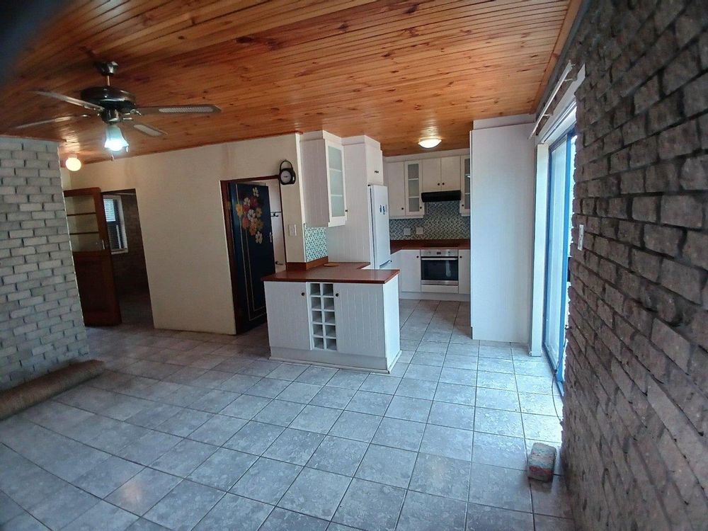 Living Area, Kitchen (at the back), Bathroom (on its left) Main Bedroom (on our left).