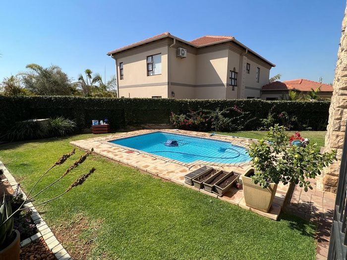 Spacious house in Silverwoods Country Estate with pool, braai, and four bedrooms. To Rent.