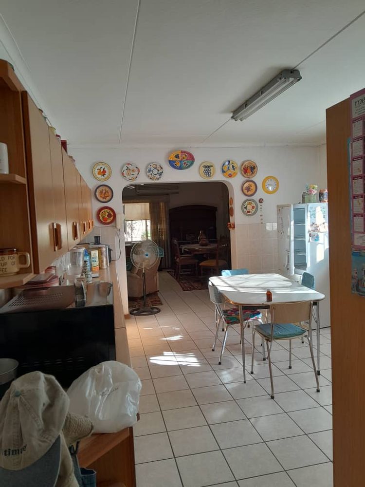 Kitchen and doorway towards the lounge and dining room