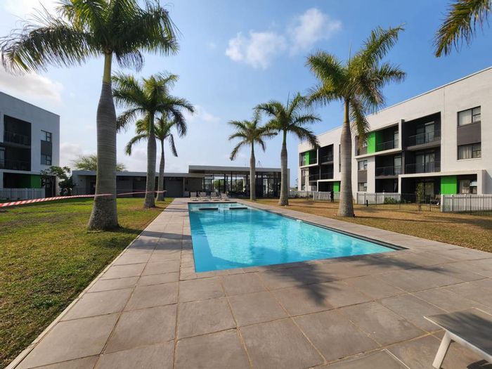 1-Bedroom Apartment To Rent in Ballito Central with security, parking, and amenities.