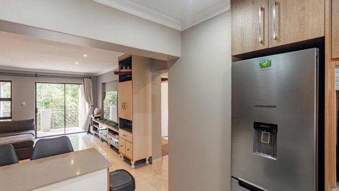 Two-bedroom apartment for sale in Fourways with pools, courts, and secure living.