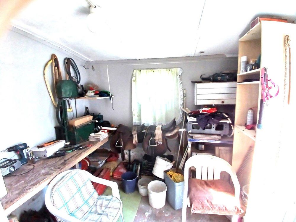 MAIN DWELLING: Store Room - just after we exited the back door.