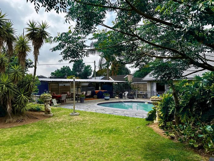 For Sale: House in Van Riebeeck Park with pool, garden cottage, and security features.