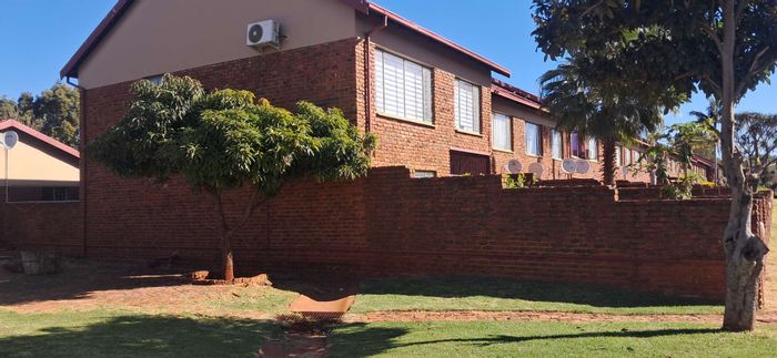 3-Bedroom Apartment For Sale in The Orchards with garage, carport, and garden.