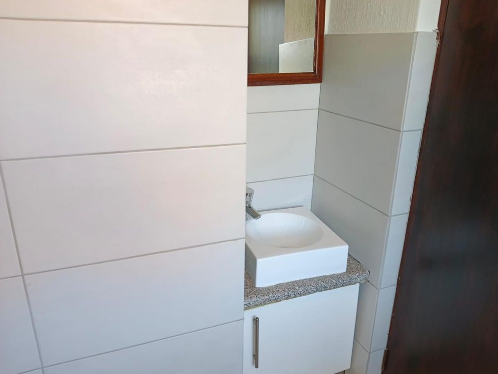 Basin with small cabinet