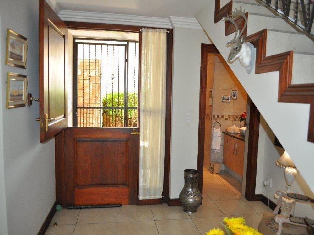 Spacious entrance with guest toilet conveniently tucked away