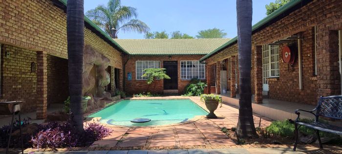 Prime Menlyn Guest House For Sale: Heated Pool, Airconditioned Bedrooms, Excellent Investment