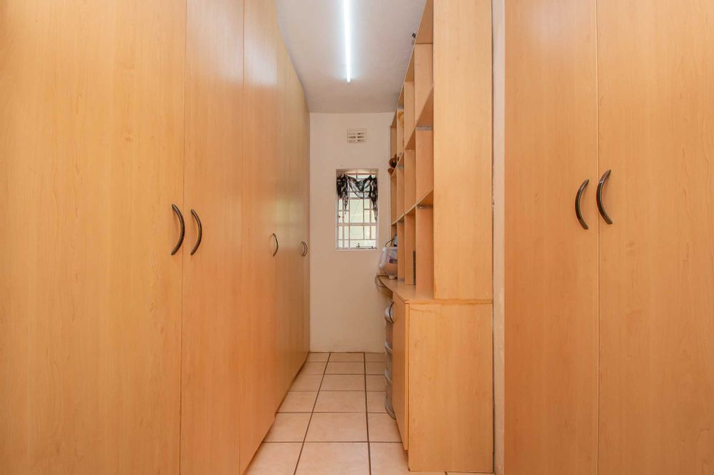 Dressing area with ample cupboards