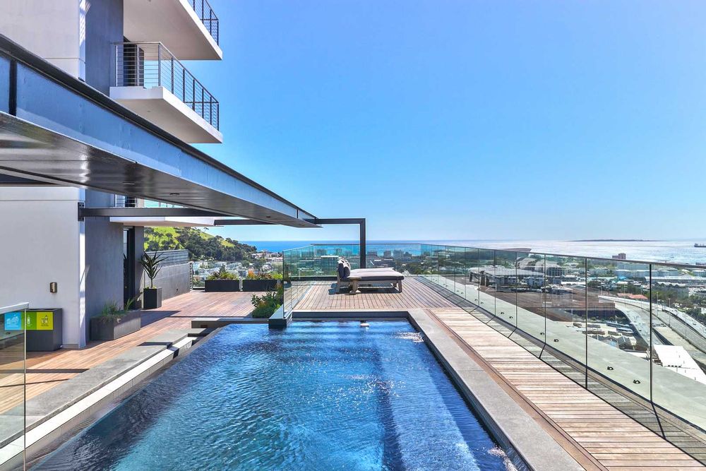 Pool deck on 27th floor with Atlantic Ocean, Green Point and Robben Island views