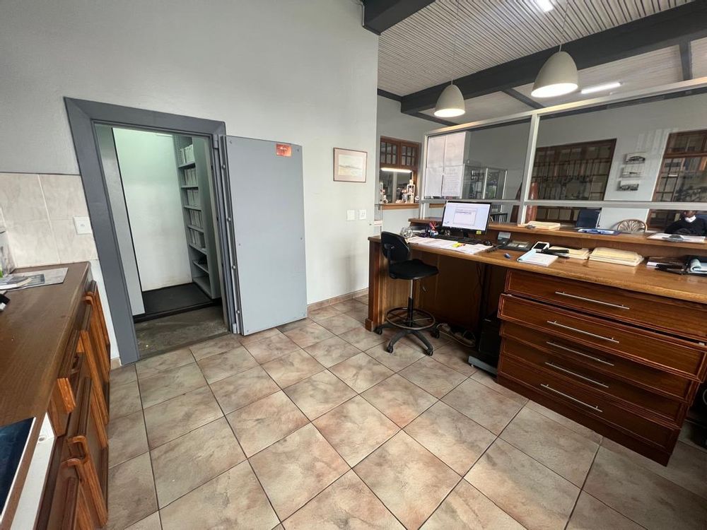 Behind front desk