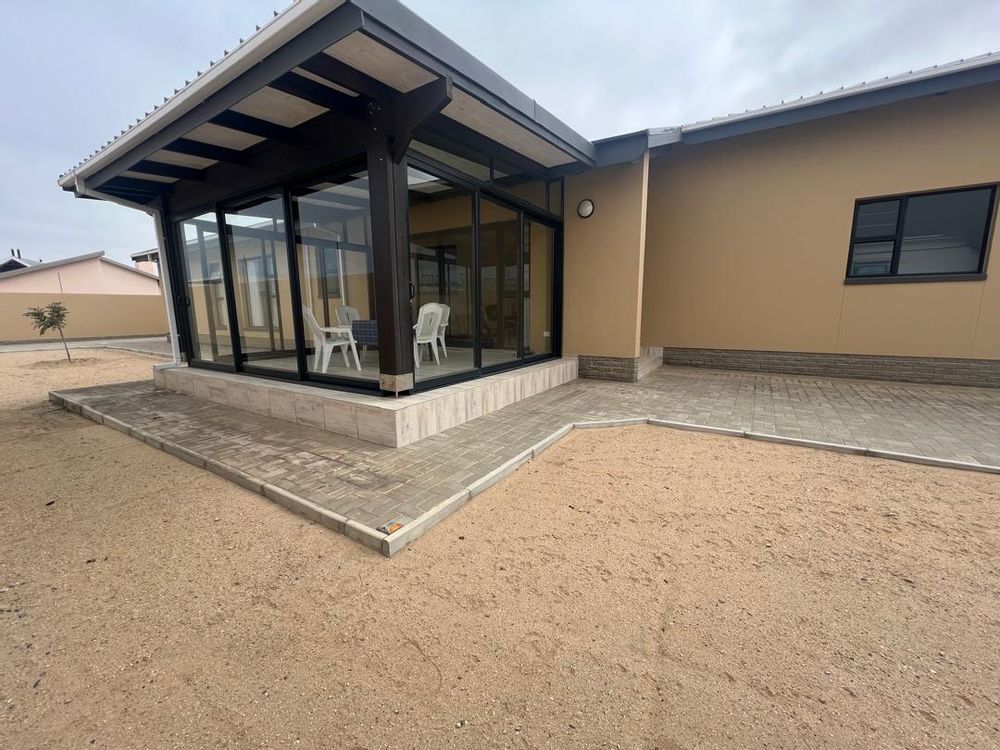 Back courtyard with enclosed patio