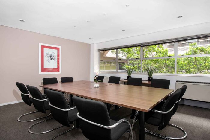 Flexible office space for rent in Parktown with shared amenities and parking.