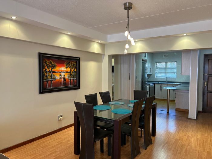 To Rent: Townhouse in Sandown with open plan living, patio, and security access.