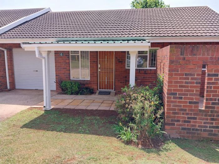 For Sale: Townhouse in Howick North with garden views, garage, and 24-hour security.