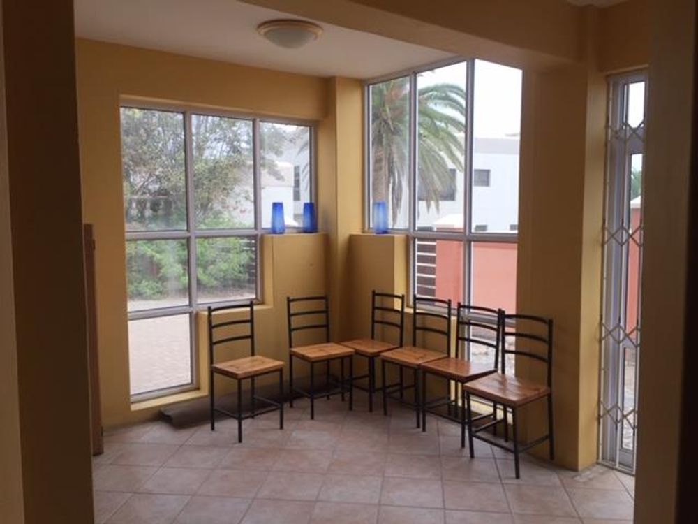 VIEW OF LOUNGE AND BBQ AND ENTRY TO KITCHEN