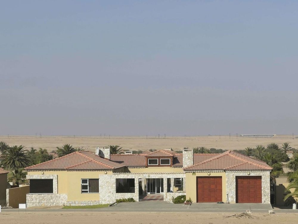 View of house with double garage