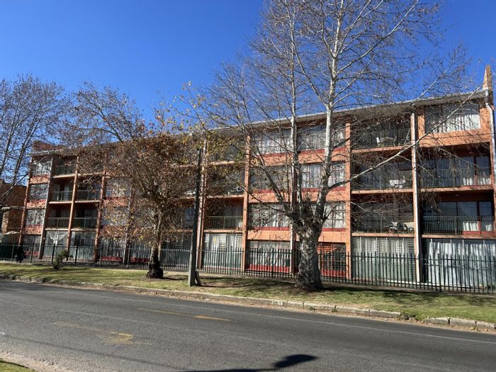 Ground floor apartment in Benoni Central, for sale with covered parking and balcony.