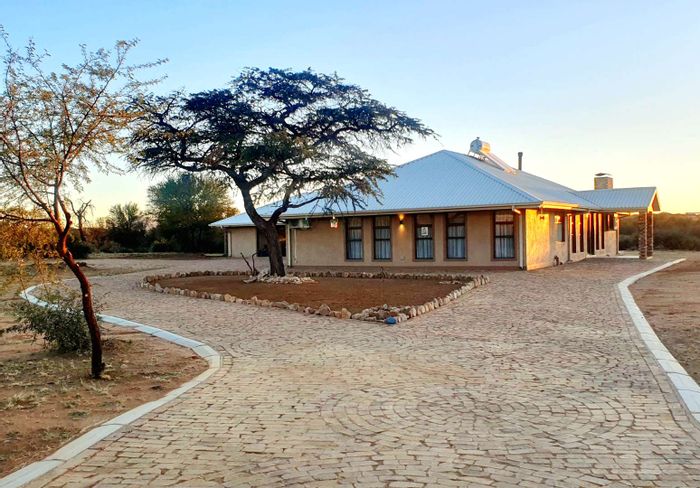 For Sale: House in Windhoek East with pool, borehole, and spacious garden.