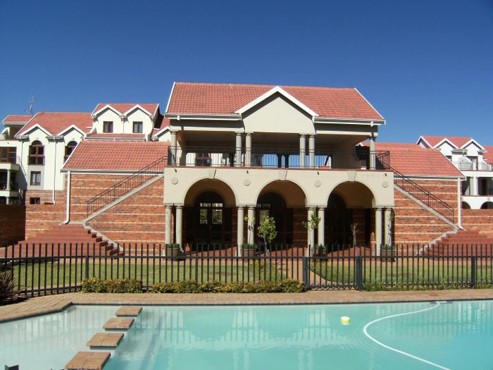 Bryanston Apartment For Sale: Open plan living, patio, pool, 24-hour security.