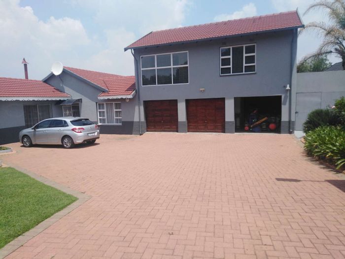 For Sale: Germiston West House with 4 bedrooms, double garage, and large lapa.