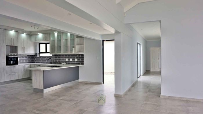 House for Sale in Mile 4 Ext 1: 3 beds, double garage, BBQ area, spacious yard.
