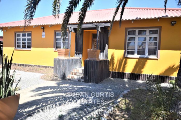 For Sale: House in Swakopmund Central with business potential, parking, and outdoor areas.