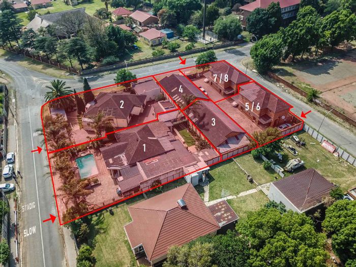 For Sale: Unique multi-dwelling investment compound in The Hill, 35 bedrooms, rental potential.