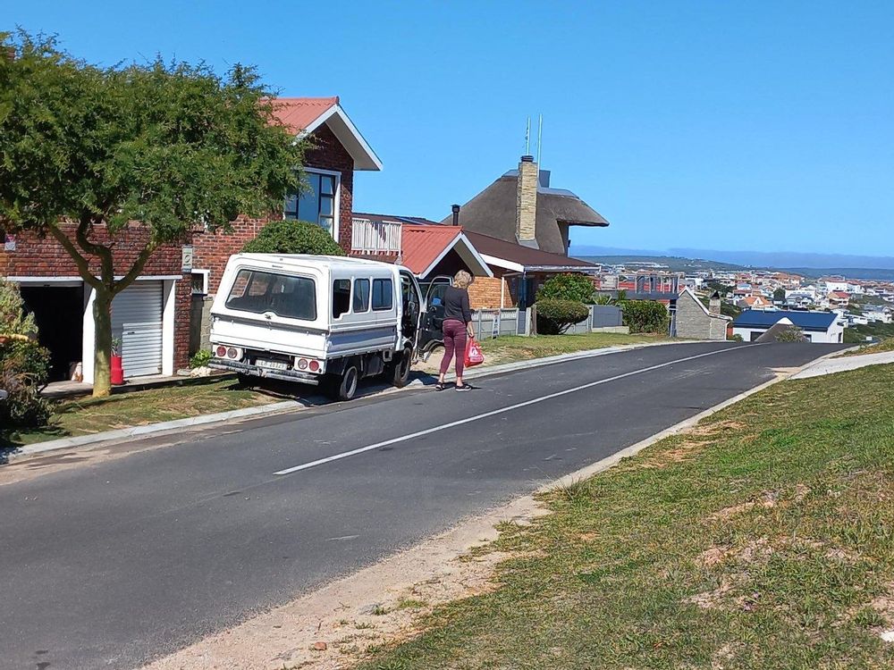 Almost same as previous photo; now displaying Houses further down the Street.