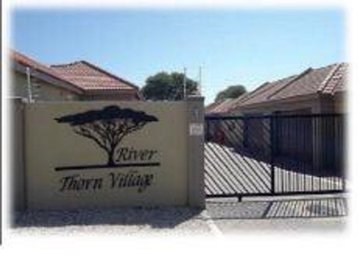 For Sale: Townhouse in Okahandja Central with BBQ, garden, and double garage.