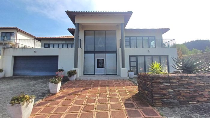 Seaside house for sale in Winterstrand with private beach access and pool.