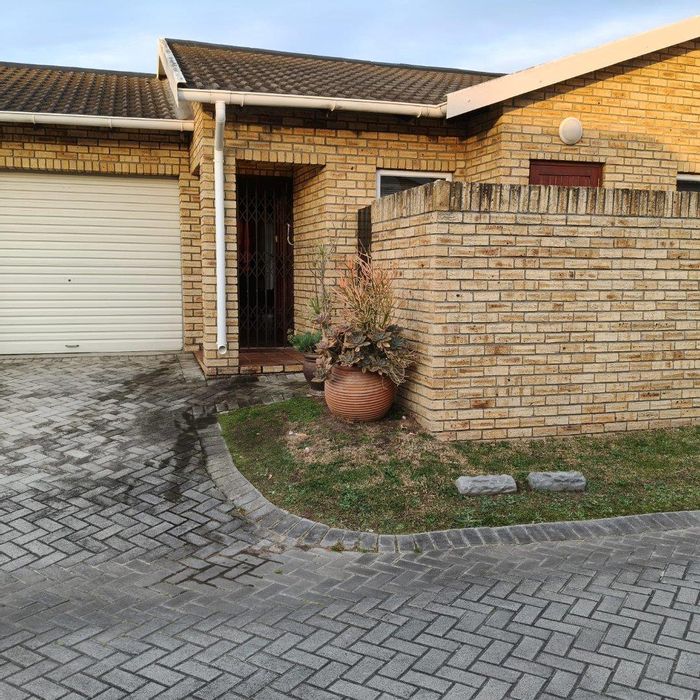 For Sale: Glenroy Park Townhouse with 3 bedrooms, garden, and double garage.