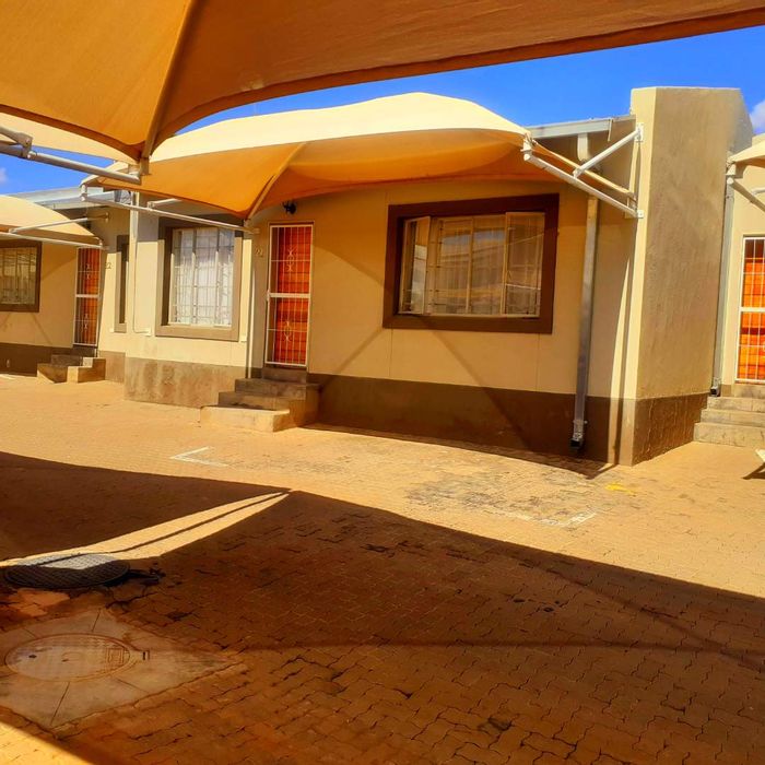 2-Bedroom Townhouse For Sale in Pioniers Park Ext 1 with private courtyard and carport.