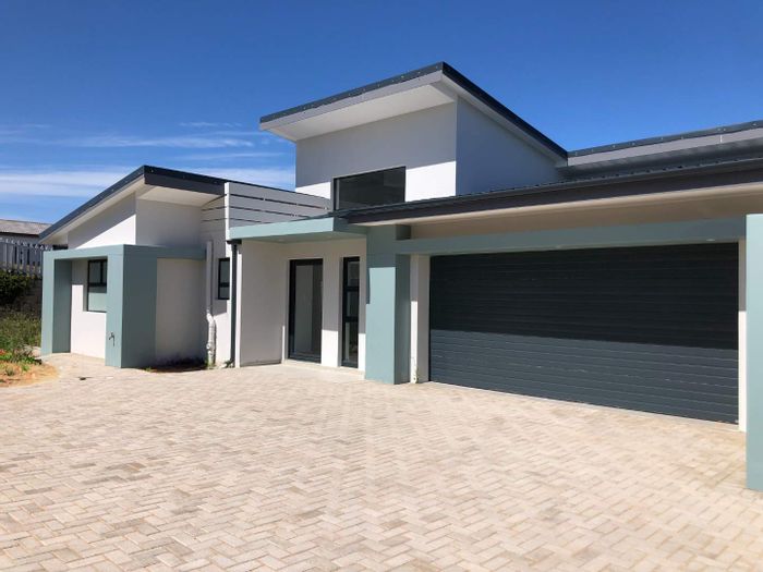 For Sale: House in Island View with ocean views, double garage, and open-plan living.