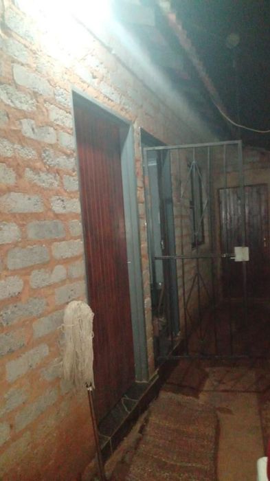 Cottage To Rent in Moleleki Ext 3: Spacious room, outside toilet, near amenities.