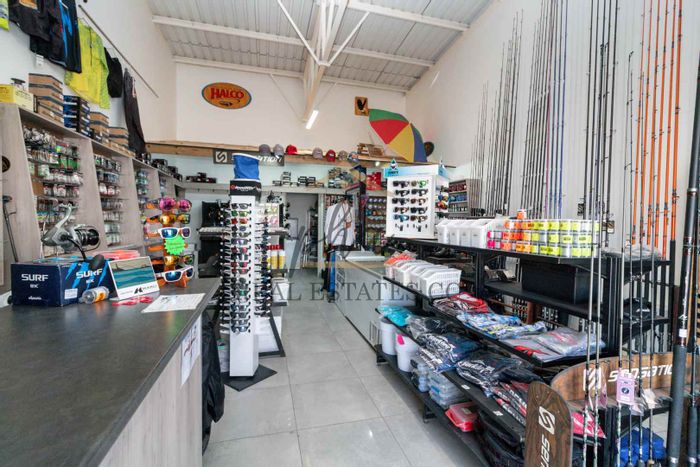 Retail fishing tackle shop for sale in Mile 4, includes inventory and equipment.